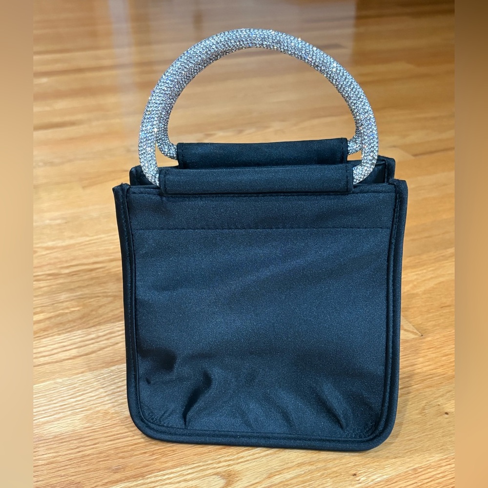 Elegant Black Handbag with Silver Handle